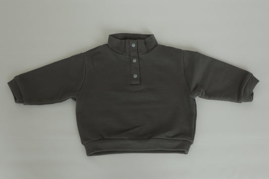 QUARTER BUTTON SWEATER